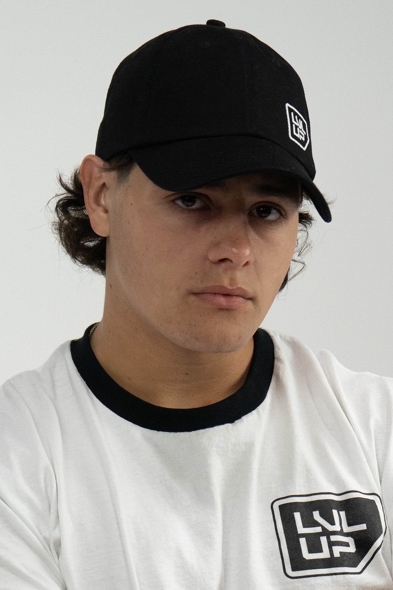 BLACK PLUG UNSTRUCTURED HAT